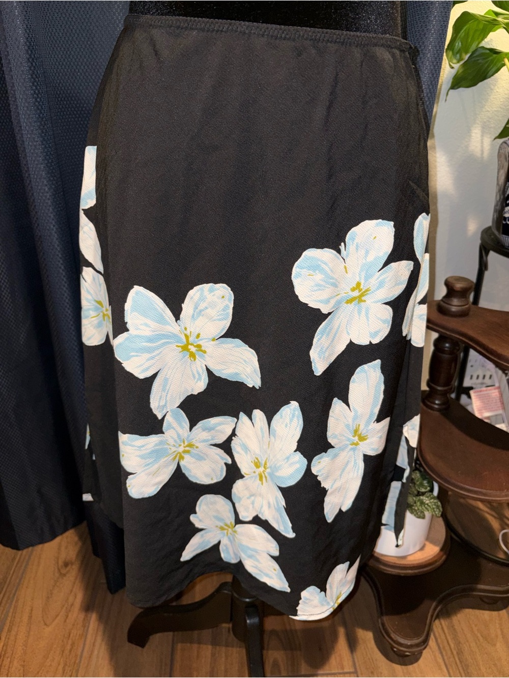 The Limited Black Midi Skirt with White and Pale Blue Floral Print